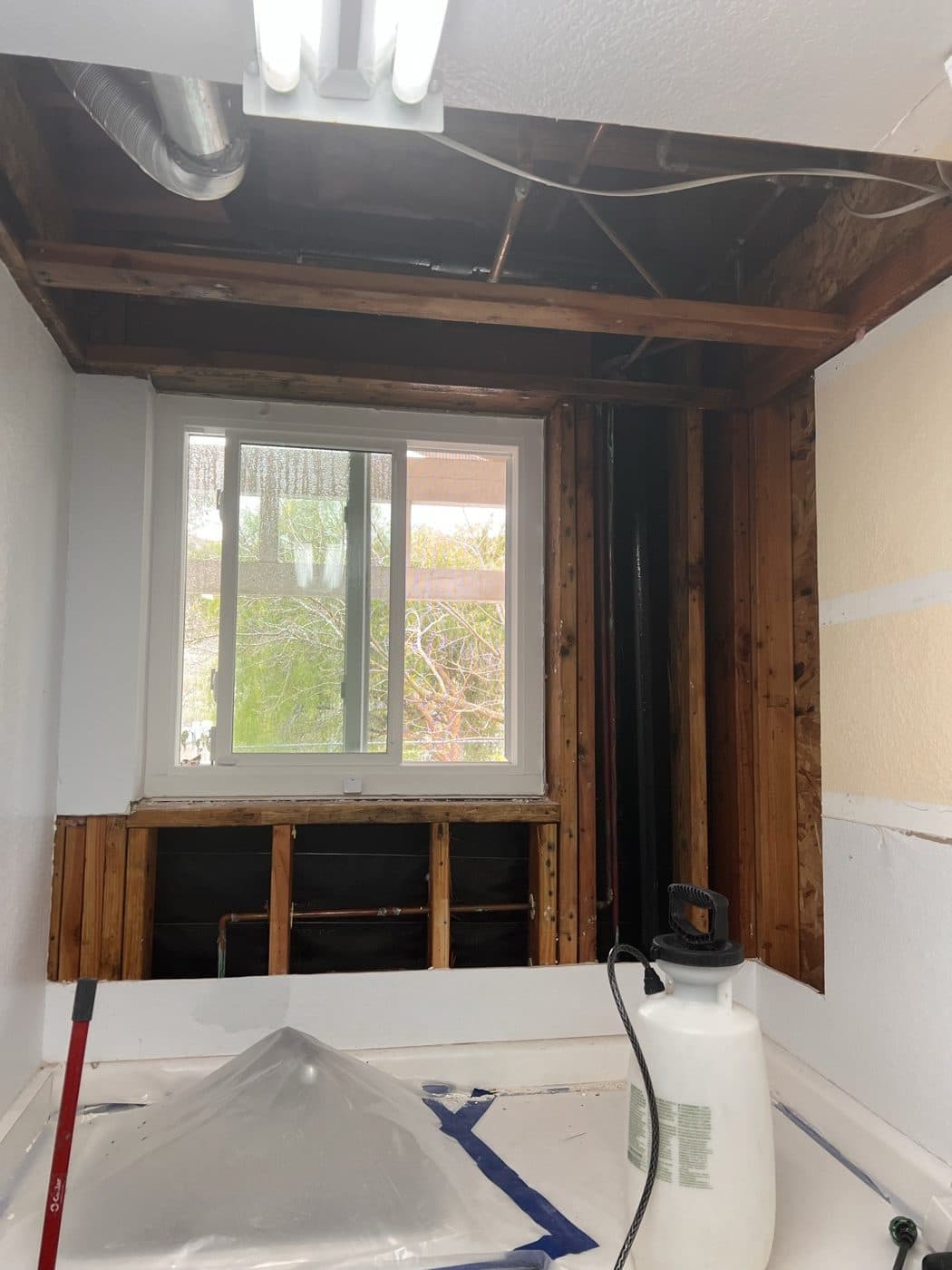 Fire-damaged framing prepped for odor treatment and repair